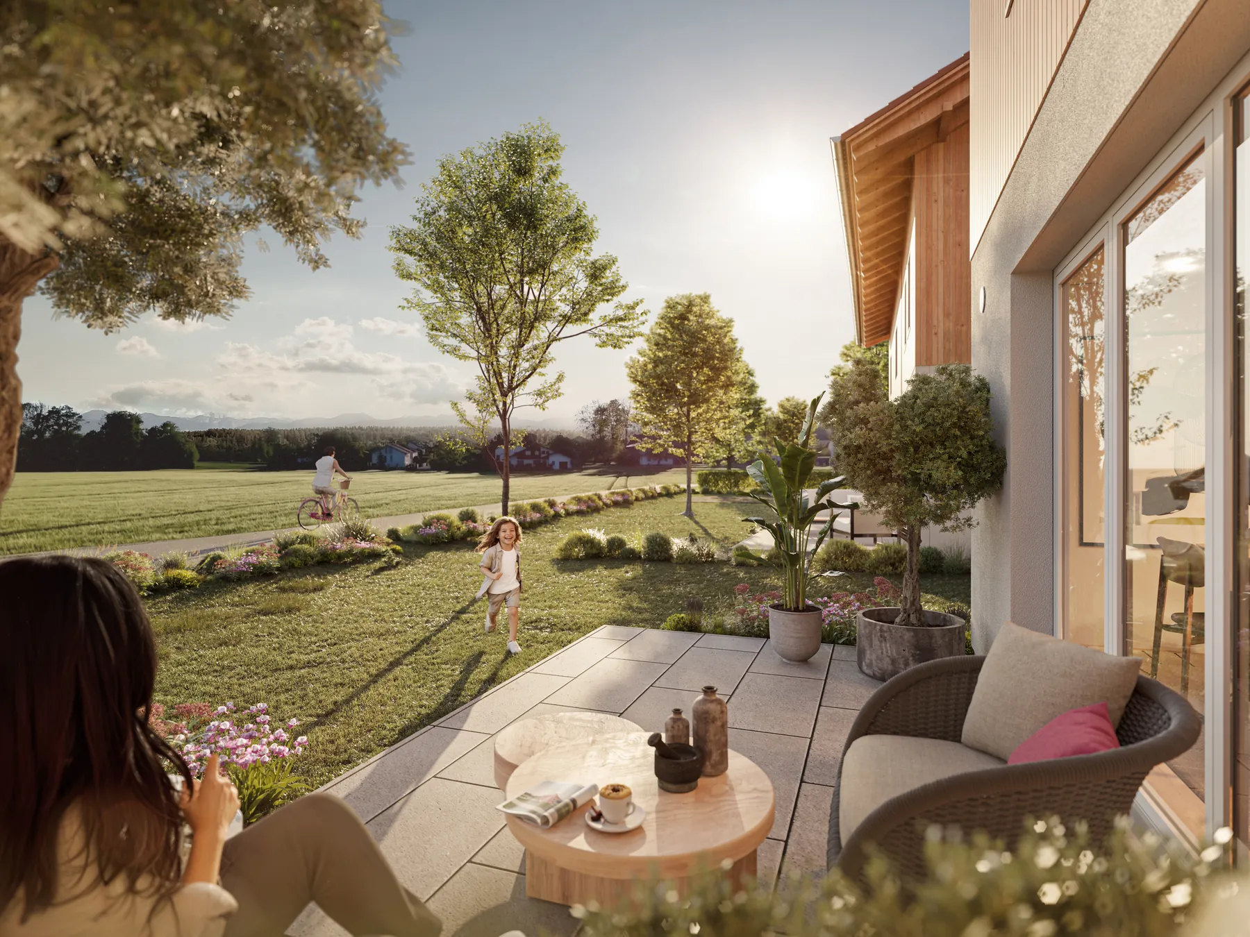 Terrasse eines Strenger Designhauses mit Blick über die Felder